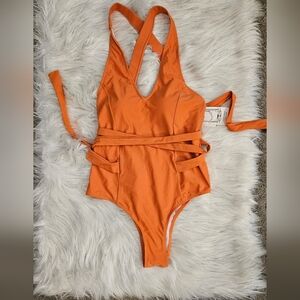 Make an unforgettable splash in this one piece swimsuit